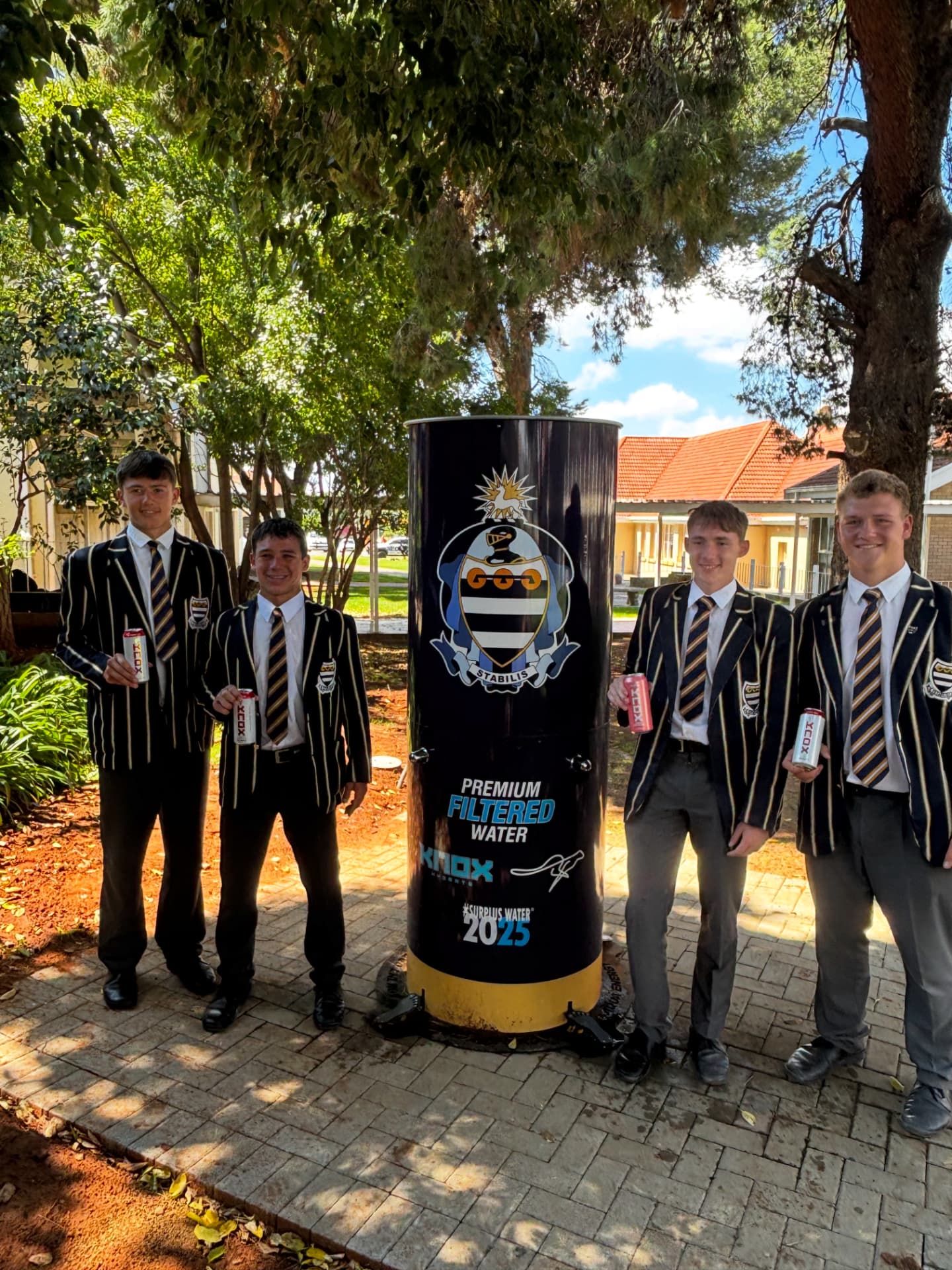 Learners with a school-branded water station